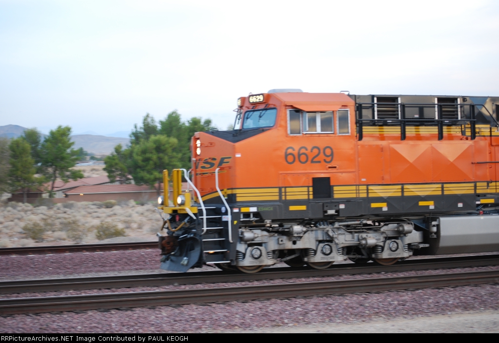 BNSF 6629 side shot of the cab as she rolls by me heading westbound.